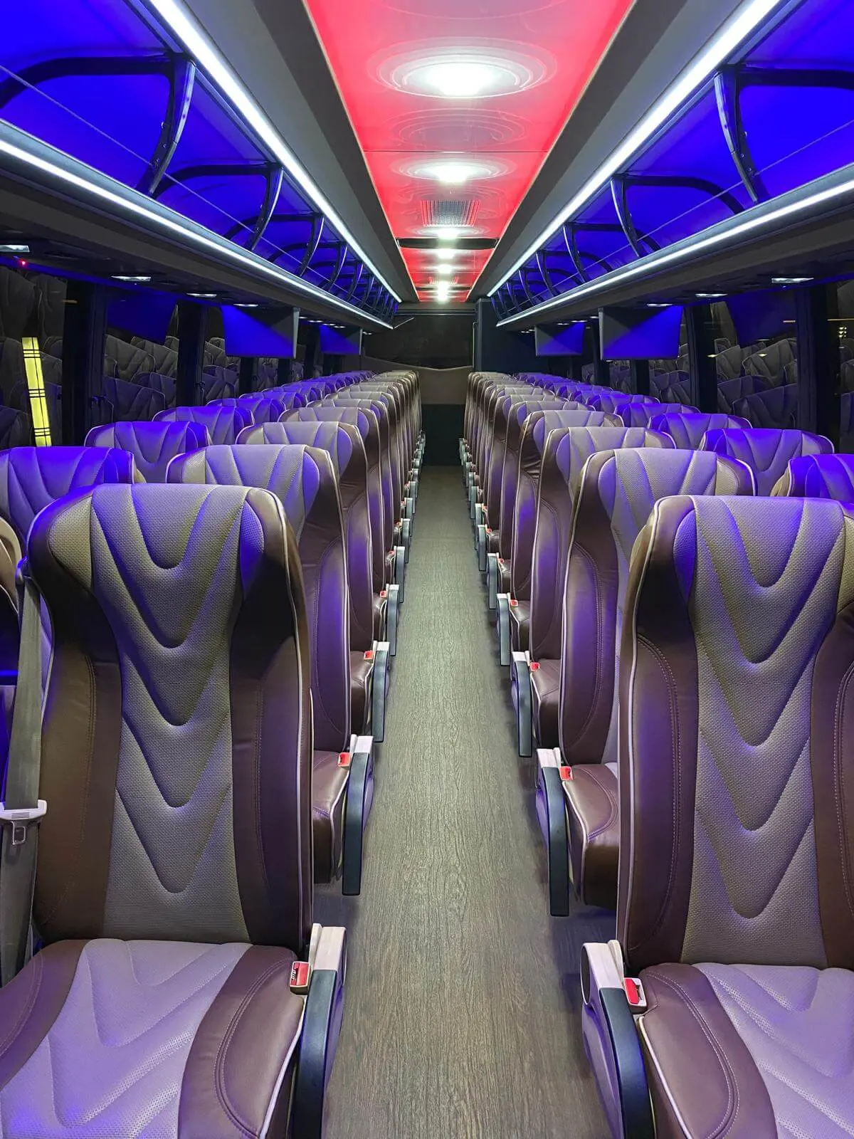Passenger seating inside the coach bus