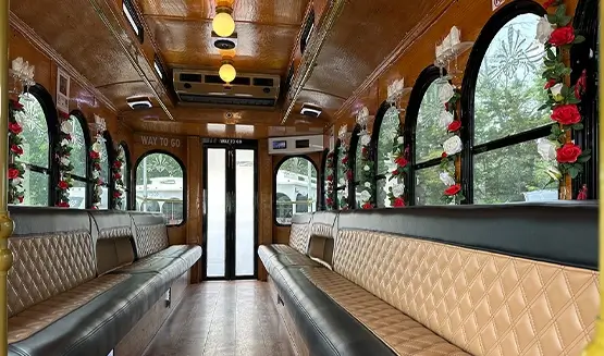 Trolley interior with rose garlands and quilted leather perimeter seating
